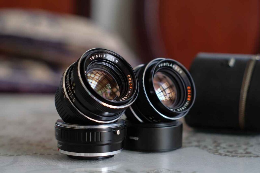 55mm vs 50mm lens